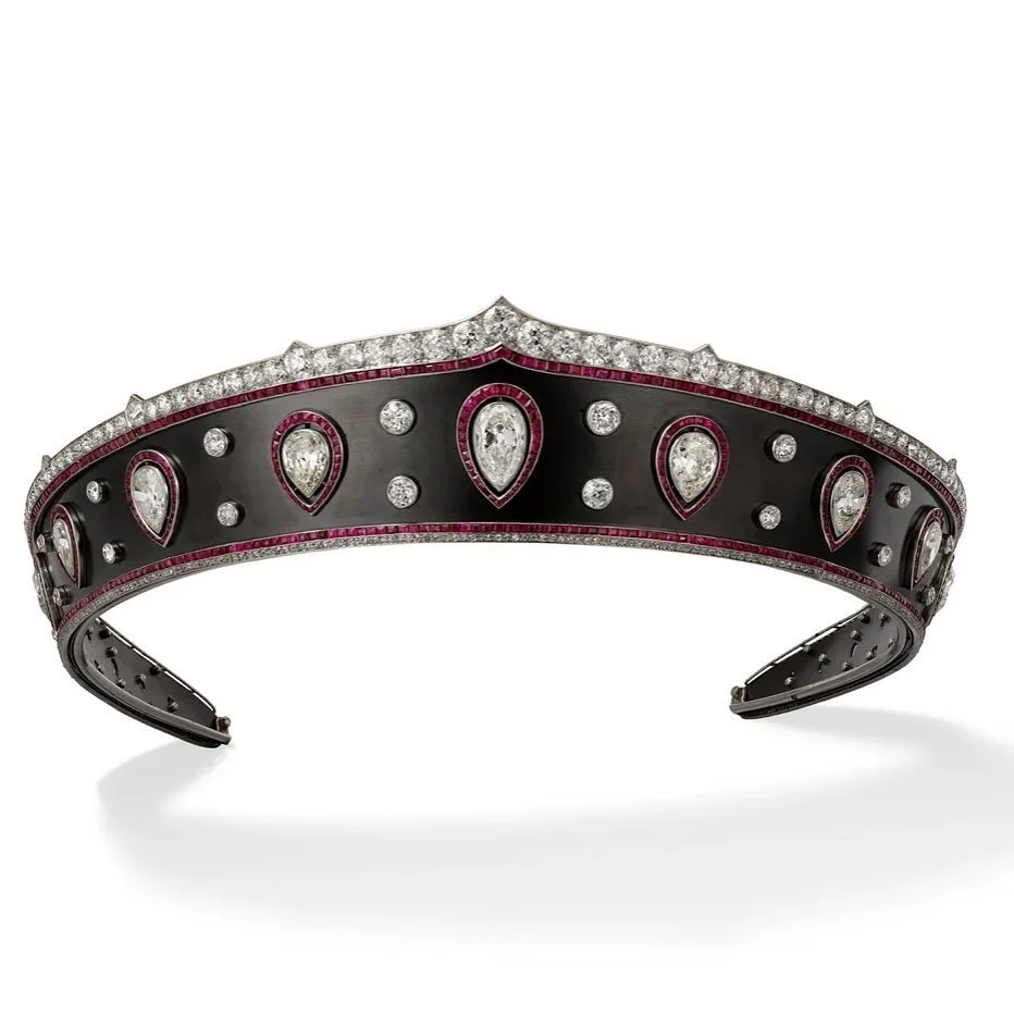 Art Deco black enamel tiara with pear-shaped diamonds, round diamonds, and ruby borders.