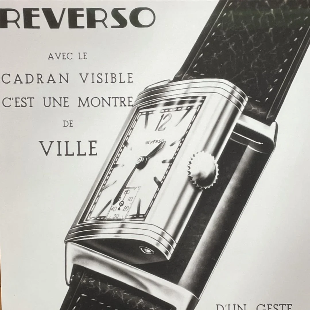 1930s black and white ad for a rectangular Art Deco Reverso watch on a strap.