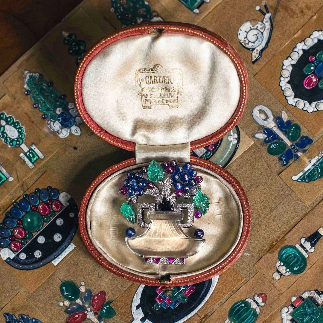 Cartier rock crystal vase brooch with sapphire, ruby, and emerald flowers, in its box.